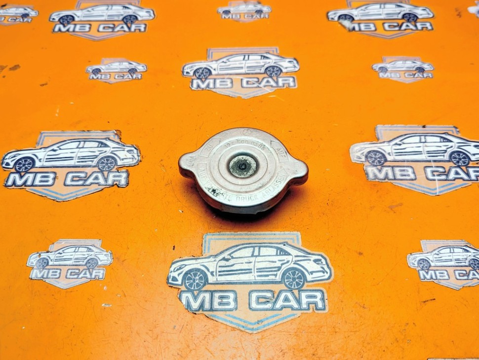 Крышка радиатора MERCEDES-BENZ E-класс W124/S124/C124/A124 (1984 - 1997) фото 1 — Разборка Мерседес